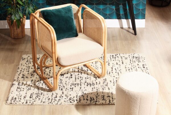 iconic indoor rattan chair with boucle latte cushion natural